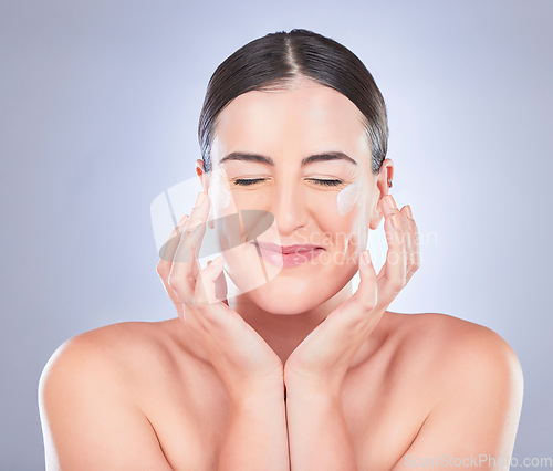 Image of Happy skincare, face and woman with cream product for luxury makeup, facial cosmetics or female acne protection. Studio dermatology, collagen hydration and beauty person isolated on grey background