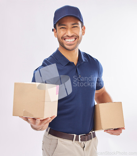 Image of Delivery man smile, shipping box and portrait of a employee in studio with courier service. Boxes, supply chain and happiness of a export worker with distribution, online shopping and mail services