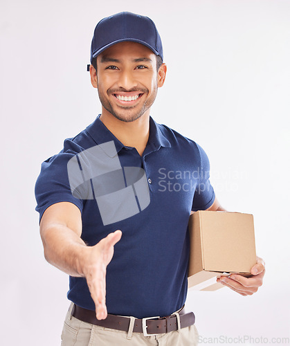 Image of Box, portrait smile and delivery man with handshake in studio isolated on a white background. Welcome, greeting or happy Asian male courier with package shaking hands for hello, logistics deal or crm