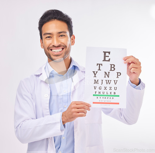 Image of Man, eye exam and smile, portrait of doctor at vision clinic, reading assessment and eyesight care in India. Healthcare, wellness and happy optometrist with medical test for eyes, health and sight.