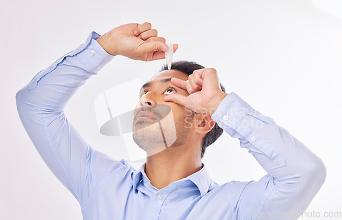 Image of Mockup, health and Asian man with eye drops, medical product and guy against grey studio background. Japan, male and gentleman with clear eyesight, allergies and dripping solution for vision problem