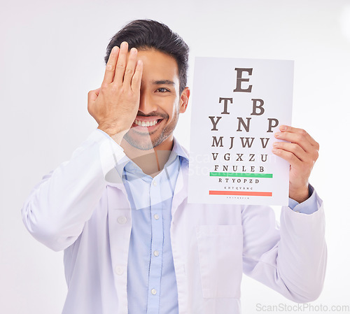 Image of Portrait of man, doctor and eye test with smile in vision clinic, hand on face and eyesight care in India. Healthcare, wellness and happy expert optician with reading exam for eyes, health and sight.