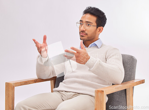 Image of Psychologist, doctor and mental health, man in therapy and listening with treatment on studio background. Therapist, counseling and serious male with medical consultation, help and psychology