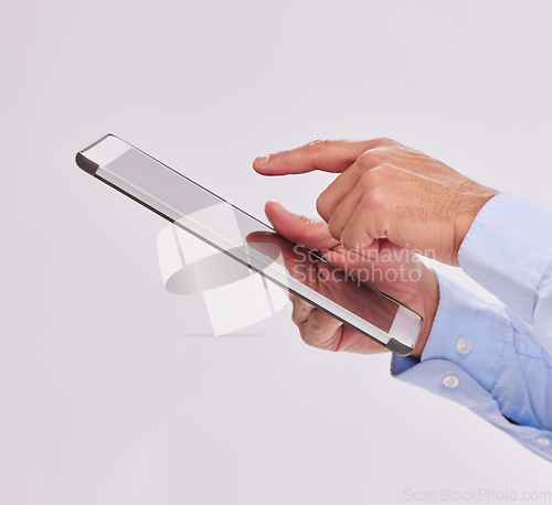 Image of Hands, tablet and business man typing in studio isolated on a white background. Technology, social media and male professional with touch screen for research, web scrolling and internet browsing.