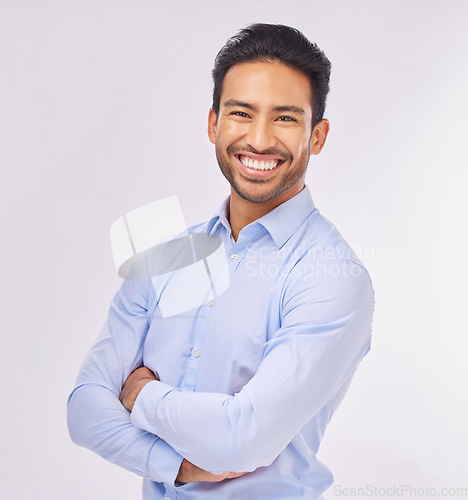 Image of Smile, portrait and business man with arms crossed in studio isolated on a white background. Ceo, professional boss and happy, confident or proud Asian male entrepreneur from Singapore with job pride