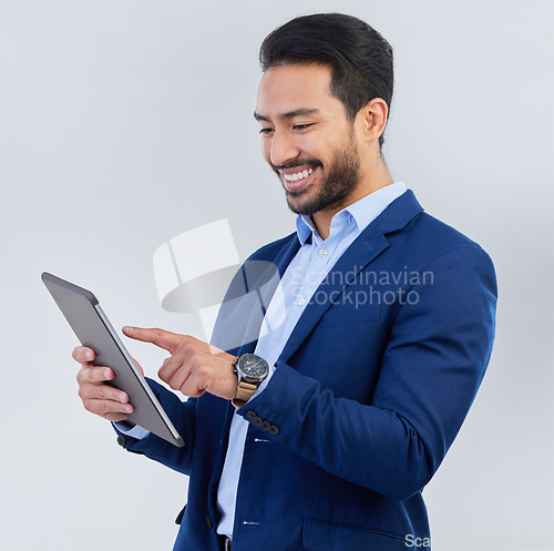 Image of Smile, tablet and asian businessman in studio reading email, networking and internet on white background. Connect, online report and man in suit, communication and technology for investor at startup.