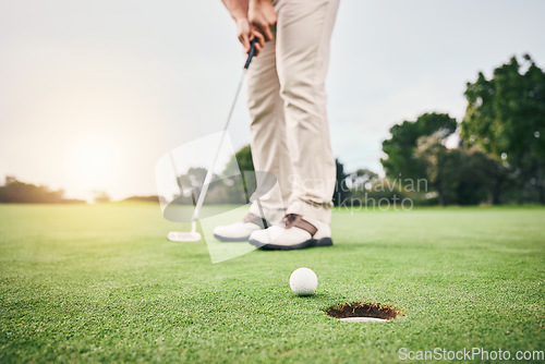 Image of Golf stroke, sport putt and golfer hands in game, fitness and exercise on grass with a swing. Athlete, lens flare and man at sports club for training and workout on green course with focus and action