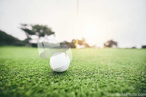 Image of Sports, golf ball and target on course in club for competition match, tournament and training. Pitch, challenge and games with equipment on grass field for leisure, recreation hobby and practice