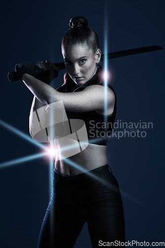 Image of Warrior, woman and sword portrait to fight in studio for action on dark background. Strong female model, assassin or agent scifi futuristic cosplay costume with weapon as ninja or vigilante mission