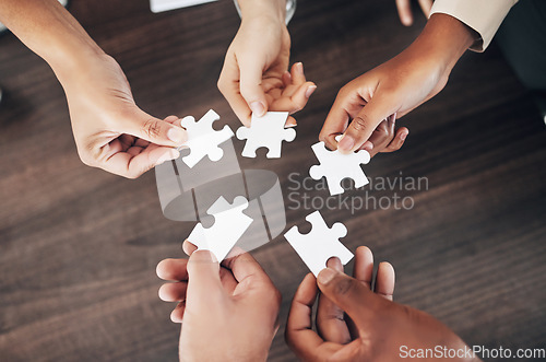 Image of Business people, hands or puzzle for teamwork, solution problem solving with planning, synergy or collaboration. Jigsaw, growth or partnership support, project development or community group mission