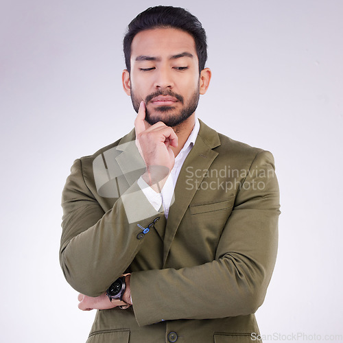 Image of Business man thinking face and ideas in studio, white background and ideas of mindset, planning and question. Entrepreneur, male model and think of decision, remember memory or brainstorming solution