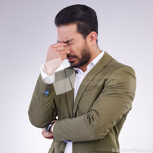 Image of Eye pain, headache and business man in studio with anxiety, debt or worry of stock market crash. Corporate male, model and migraine of stress, bankruptcy and burnout of financial crisis in depression