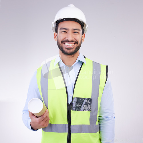 Image of Construction worker man in portrait isolated on a white background engineering, architecture and design career. Happy face of asian builder, contractor or industrial person with safety gear in studio