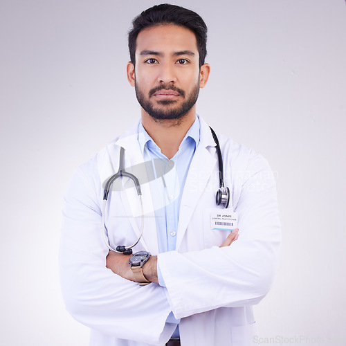 Image of Proud portrait of man or doctor isolated on a white background for healthcare services, leadership and career mindset. Serious face of medical professional or asian person for cardiology in studio