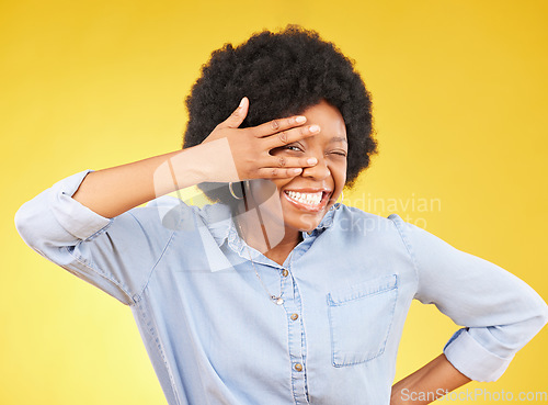 Image of Excited, V and black woman hand on face and surprised winning person isolated in studio yellow background. Portrait, success and female winner happy for deal, sale and good news announcement