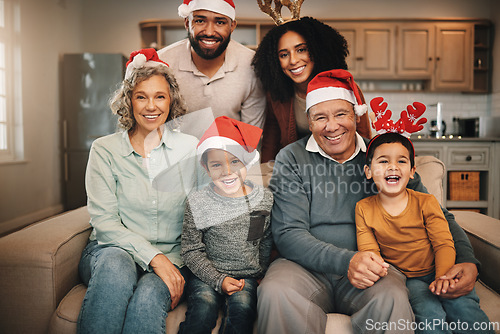 Image of Christmas, big family and portrait smile on sofa in living room in home, bonding and care. Xmas, laughing and happy grandmother, grandfather and parents with boys or children enjoying holiday time.