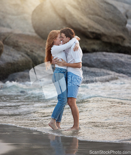 Image of Love, hug and happy with couple at beach for romance, relax and vacation trip. Travel, sweet and cute relationship with man and woman holding in embrace on date for summer break, trust and bonding