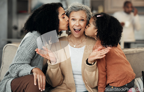 Image of Portrait, surprise or love with a daughter and granddaughter kissing a senior woman on the cheek in a home. Mothers day, wow or children with a girl and mother giving a kiss to a grandmother