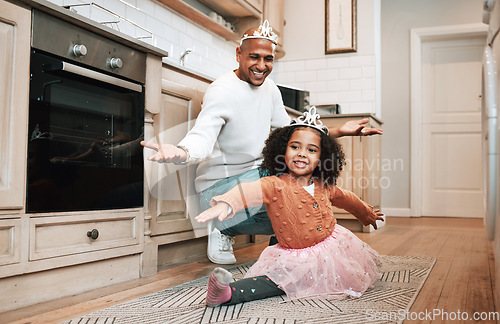 Image of Child learning, ballet tutu and father in a kitchen excited about young girl dancing with flexibility. House, family and parent love in a home with a kid having fun with support in a household