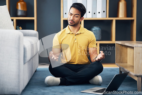 Image of Meditation, laptop and a yoga man with an online video for mental health, wellness or zen in his home. Fitness, internet and virtual class with a male yogi in the living room to meditate for peace