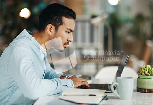 Image of Business, focus and man with laptop, research and online reading in workplace, software update or website design. Male employee, consultant or worker with device, technology or typing with connection