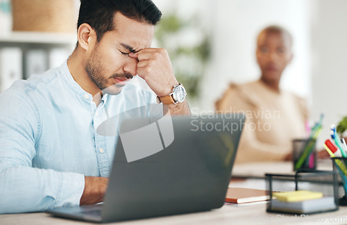 Image of Stress headache, burnout and Indian man exhausted, overwhelmed with workload deadline in office. Frustrated, overworked and tired employee with pain, hand on head and anxiety for time pressure crisis