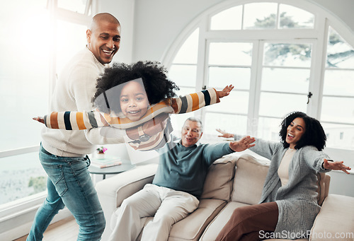 Image of Airplane, father and girl in lounge, family an playing with love, quality time and cheerful together. Portrait, happy dad lifting daughter and granddad with mother, joyful and games in living room