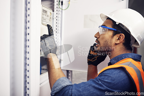 Image of Man, phone call and engineering in control room, switchboard or industrial system inspection. Male electrician talking on smartphone at power box, server mechanic or electrical substation maintenance
