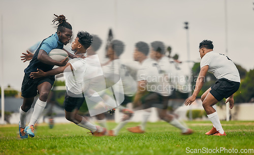 Image of Rugby, tackle and black man with ball running to score goal on field at game, match or practice workout. Sports, fitness and motion, player in action and blur on grass with energy and skill in sport.