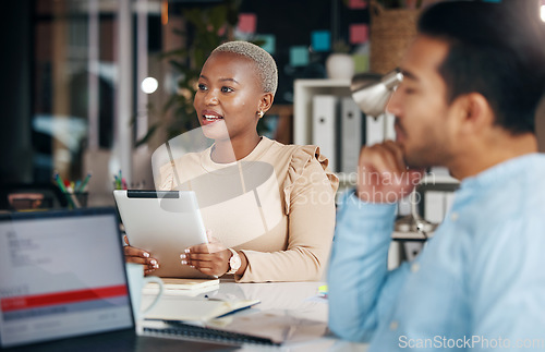 Image of Meeting, presentation and black businesswoman briefing her team using a tablet in a boardroom planning and brainstorming. Employee, corporate and female manager or leader talking and presenting