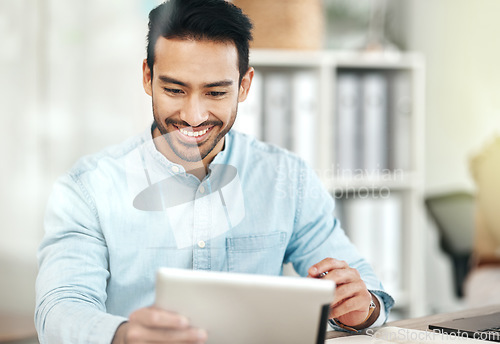 Image of Creative asian man, tablet and smile for planning, design or social media at the office desk. Happy male employee smiling on touchscreen for business plan, strategy or online browsing at workplace