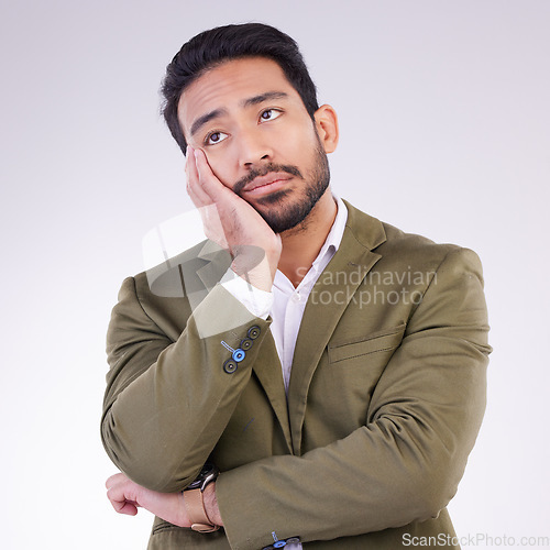 Image of Business, stress and Asian man tired, burnout and overworked against studio background. Japanese male employee, entrepreneur and agent with anxiety, fatigue or financial problems with startup company