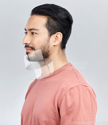 Image of Face profile, beauty and Asian man in studio isolated on a gray background or backdrop. Thinking, aesthetics idea and male model posing for healthy skin for skincare, health cosmetics and wellness.