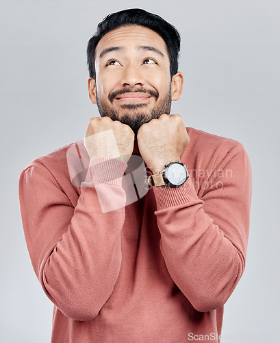 Image of Happy, looking and a handsome Asian man thinking isolated on a white background in a studio. Cute, smile and a Chinese guy with an idea, adorable pose and dreaming on a backdrop with happiness