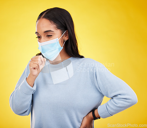 Image of Covid, cough and sick with woman in studio for medical, virus and breathing problems. Illness, pandemic and healthcare with female and face mask on yellow background for disease, infection and flu