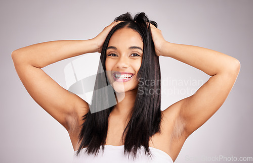 Image of Beauty, hair style and happy with portrait of woman in studio for shampoo, confidence and keratin treatment. Textures, salon and shine with model on white background for glow, self care and cosmetics