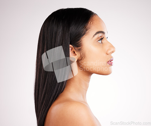 Image of Hair, profile and beauty of a woman in a isolated, white background and studio with salon treatment. Cosmetics, self care and young female model with healthy hairstyle texture and haircut growth