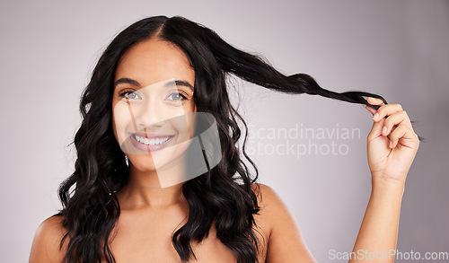 Image of Hair, woman and beauty, happy in portrait with cosmetics and hairstyle on studio background. Wellness, shine and female smile, face and cosmetic care, keratin treatment and texture, volume and mockup