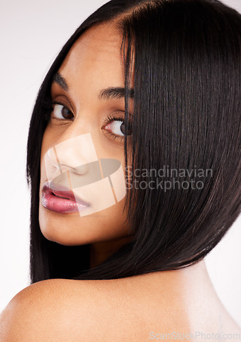 Image of Hair, portrait and face beauty closeup of a woman in a isolated, white background and studio with salon treatment. Cosmetics, self care and young female model with healthy hairstyle and makeup