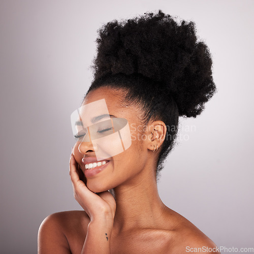 Image of Skincare, smile and black woman with eyes closed in confidence, white background and cosmetics. Health, dermatology and natural makeup and African model in studio for healthy skin and wellness.