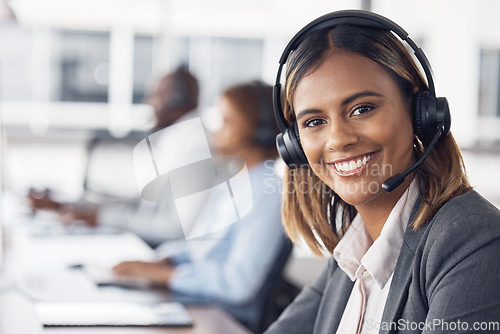 Image of Woman, call center and portrait smile with headset for telemarketing, customer service or support at office desk. Happy female consultant or agent smiling with headphones for online advice or help