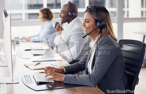 Image of Call center woman, computer and typing with smile, reading and customer support with happiness at job. Indian telemarketing consultant, desktop pc and happy crm with communication in modern office