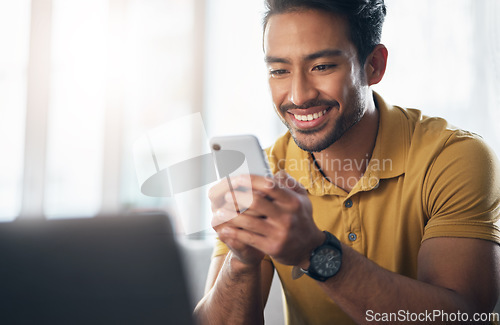 Image of Happy asian man, phone and smile for social media, communication or networking at home. Male freelancer smiling on mobile smartphone app for chatting, texting or browsing on internet or research