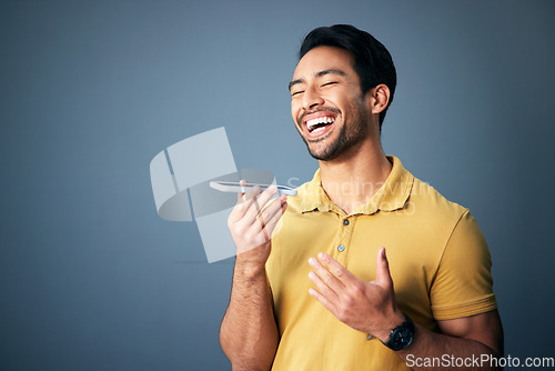 Image of Mockup, phone call and Asian man with speaker, funny and guy laughing against a studio background. Japan, male and gentleman with cellphone, humor and conversation with joy, cheerful and connection