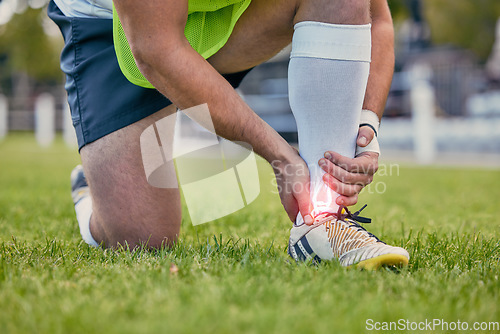 Image of Sports, foot pain and man with injury on field after practice match, training and game outdoors. Medical emergency, accident and rugby athlete with joint inflammation, x ray sprain and tendinitis