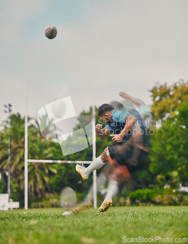 Image of Rugby, motion and man kicking ball to score goal on field at game, match or practice workout. Sports, fitness and action, player running to kick at poles on grass with energy and skill in team sport.