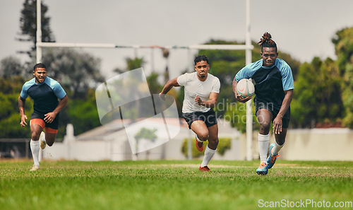 Image of Rugby, running or sports men in game playing a training game for cardio exercise or workout outdoors. Fitness speed, black man or fast African athlete player with ball exercising on field in stadium