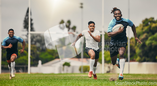 Image of Rugby team or people running fast on field in competition, game or match strategy, energy and challenge for goals. Speed of sports men, athlete or friends on pitch for gaming event moving in action