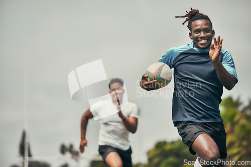 Image of Rugby, energy and black man with ball running to score goal on field at game, match or practice workout. Sports, fitness and motion, player in action and blur on grass with action and skill in sport.