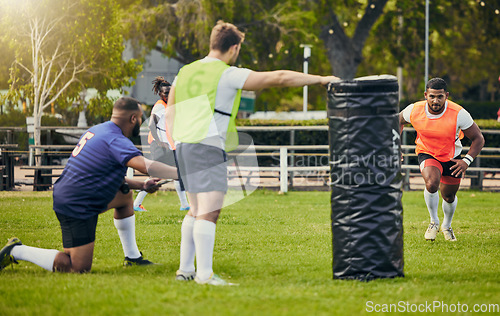 Image of Rugby, teamwork and men training on field with equipment ready for match, practice and sports game. Fitness, performance and male athletes running for warm up, exercise and workout for competition